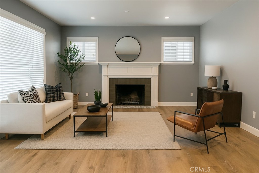 2108 La Paloma Avenue Alhambra, CA 91803 - Photo 1 of 15 a living room with furniture and a fireplace