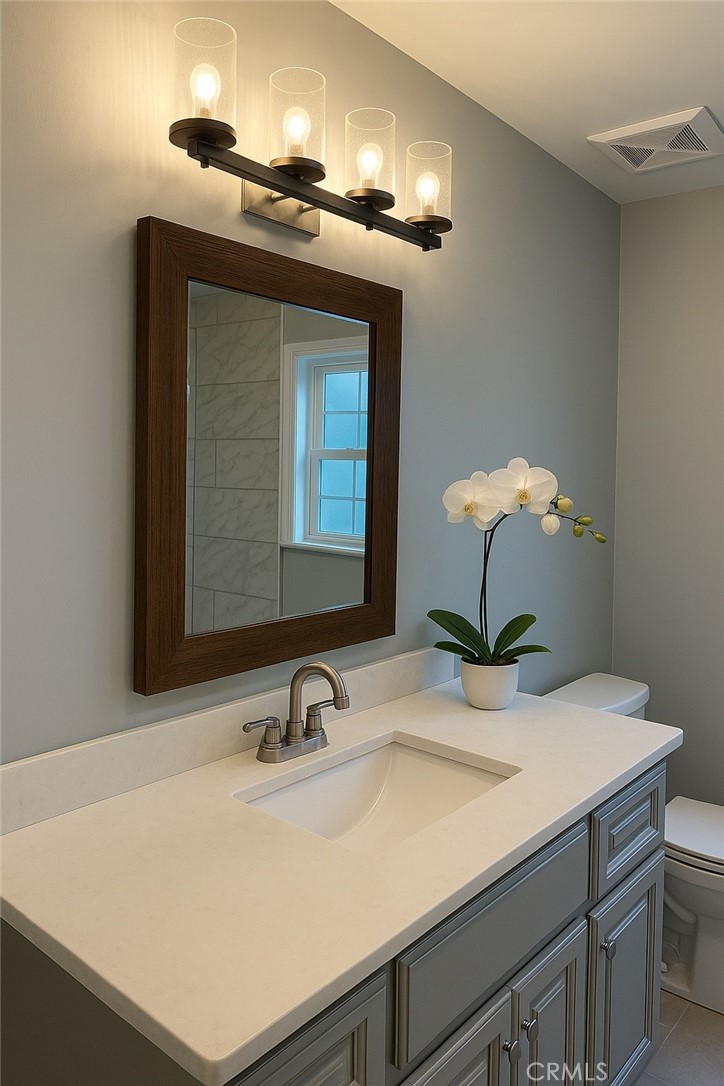 2108 La Paloma Avenue Alhambra, CA 91803 - Photo 12 of 15 a bathroom with a sink and a mirror