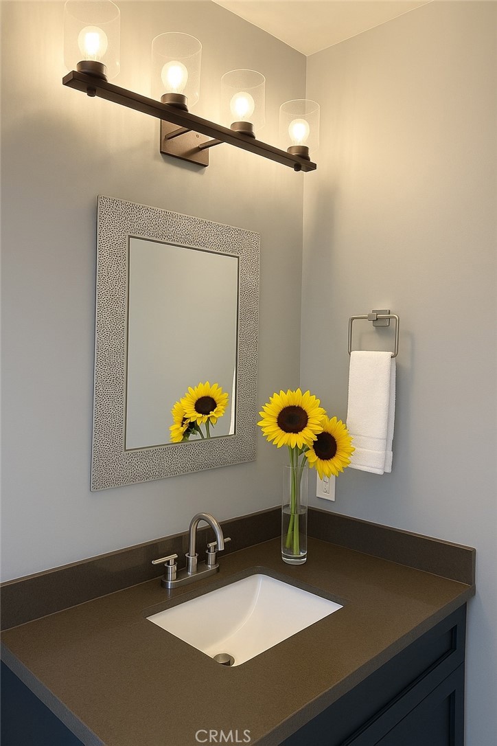 2108 La Paloma Avenue Alhambra, CA 91803 - Photo 7 of 15 a bathroom with a sink and a mirror