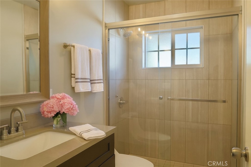 2108 La Paloma Avenue Alhambra, CA 91803 - Photo 9 of 15 a bathroom with a sink mirror and vanity