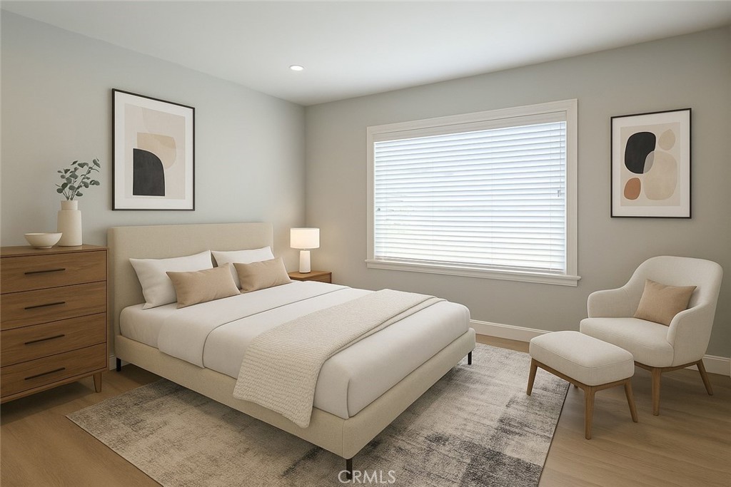 2108 La Paloma Avenue Alhambra, CA 91803 - Photo 10 of 15 a bedroom with a bed and a chair