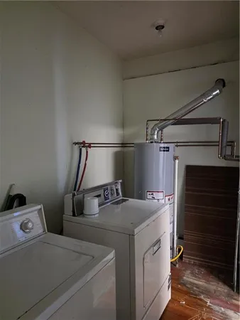 a utility room with dryer and washer