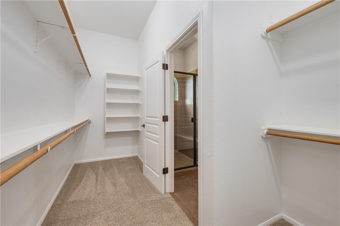 3085 Archer Circle Bryan, TX 77808 - Photo 14 of 31 a view of a walk in closet