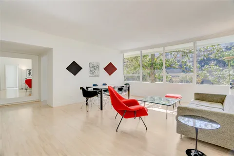 a kitchen with stainless steel appliances granite countertop a stove and a refrigerator