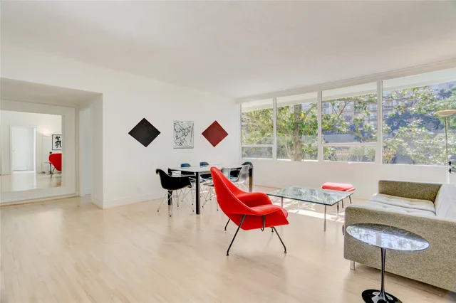 a kitchen with stainless steel appliances granite countertop a stove and a refrigerator