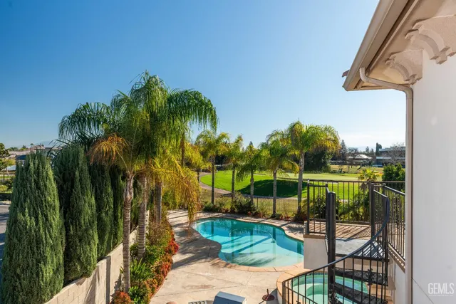 a view of balcony and porch with furniture