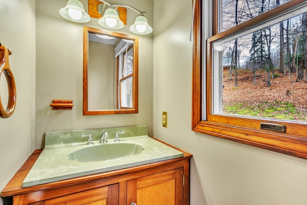 1 Flagg Hill Road Heath, MA 01346 - Photo 12 of 26 a bathroom with a sink and a mirror