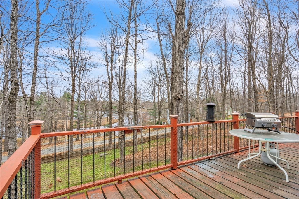 1 Flagg Hill Road Heath, MA 01346 - Photo 18 of 26 a view of a brick house with large trees and a backyard