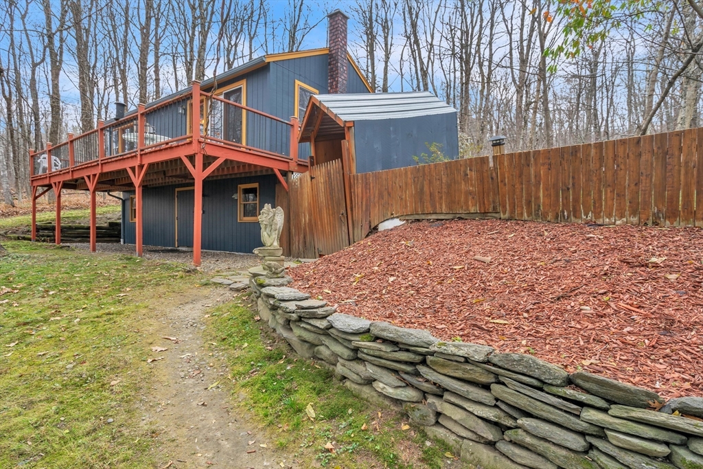 1 Flagg Hill Road Heath, MA 01346 - Photo 22 of 26 a front view of a house with a yard