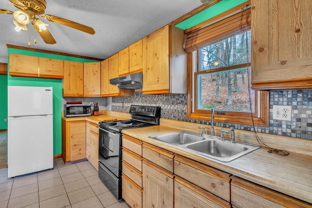 1 Flagg Hill Road Heath, MA 01346 - Photo 3 of 26 a kitchen with a sink cabinets and window