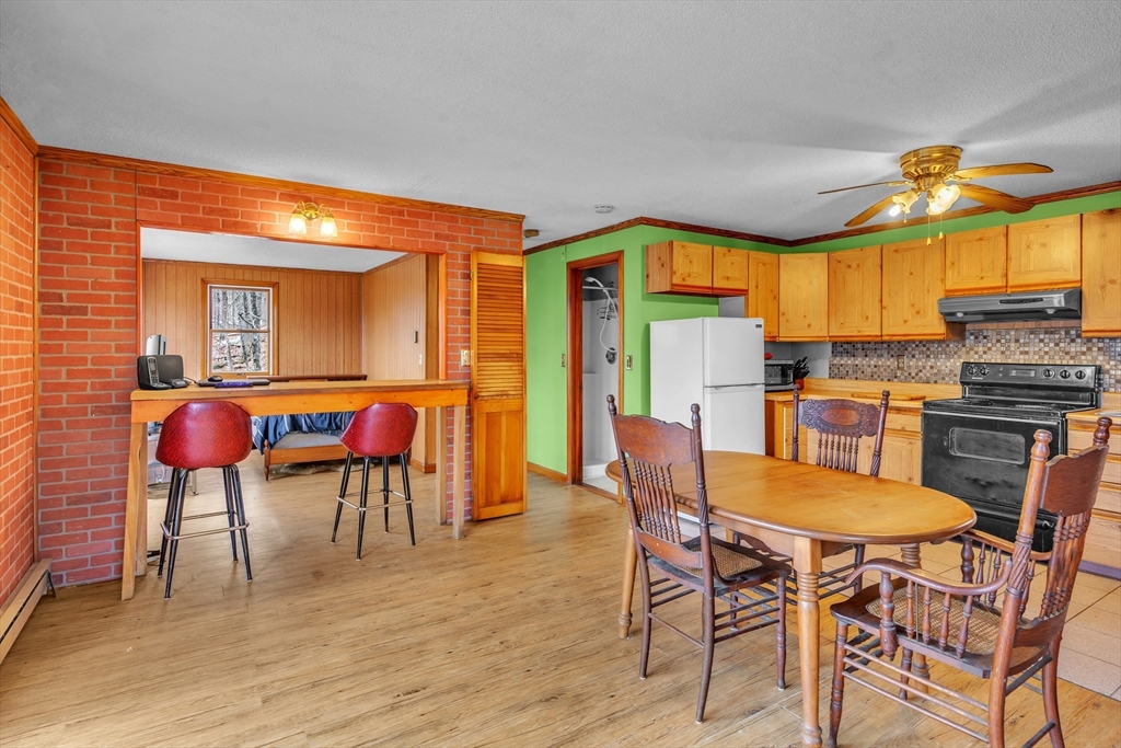 1 Flagg Hill Road Heath, MA 01346 - Photo 7 of 26 a view of a dining room with furniture and chandelier