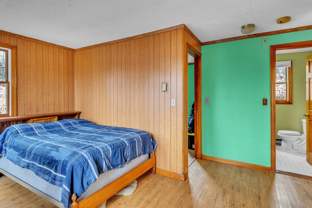 1 Flagg Hill Road Heath, MA 01346 - Photo 8 of 26 a bedroom with a bed and a window