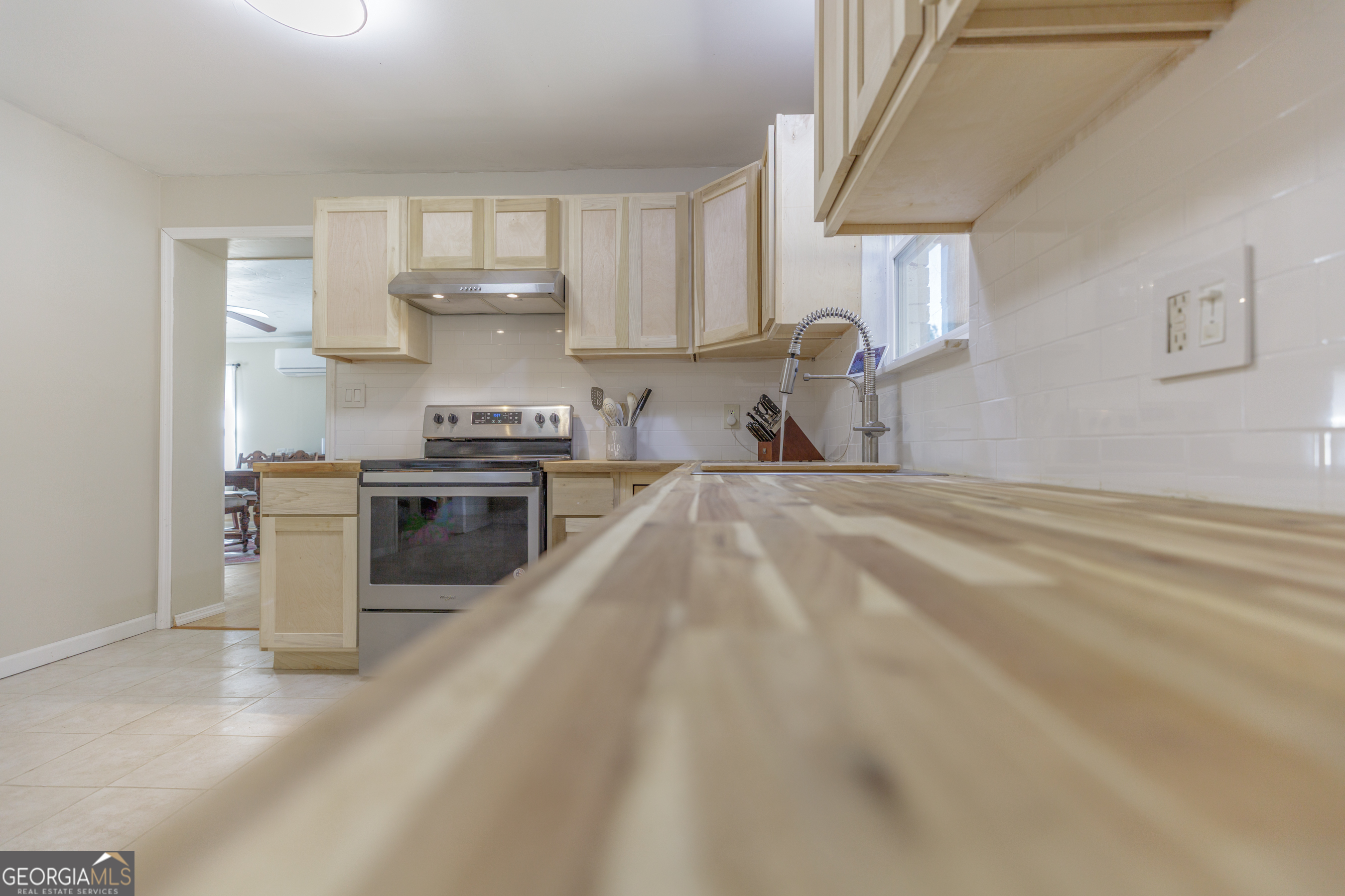 1144 Ridgeway Road LaFayette, GA 30728 - Photo 12 of 79 a kitchen with stainless steel appliances granite countertop a sink a stove and a refrigerator