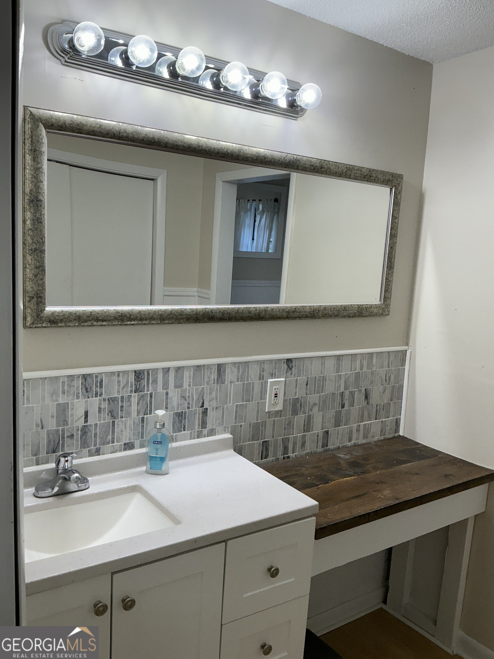 1144 Ridgeway Road LaFayette, GA 30728 - Photo 6 of 79 a bathroom with a sink and a mirror