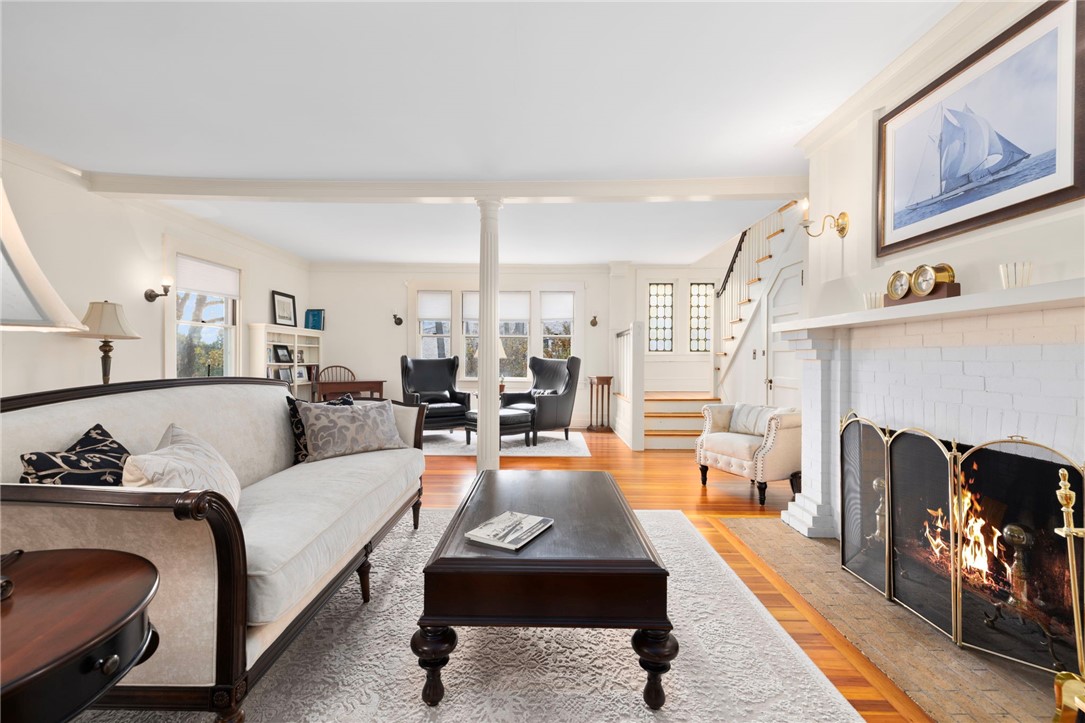 63 Longfellow Road Jamestown, RI 02835 - Photo 14 of 45 A beautiful brick fireplace adds warmth and charm to your gatherings.