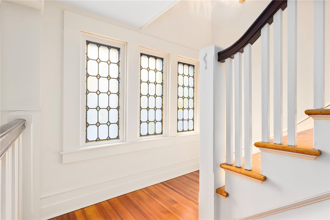 63 Longfellow Road Jamestown, RI 02835 - Photo 27 of 45 Let's take the main staircase, look at that beautiful stained glass.