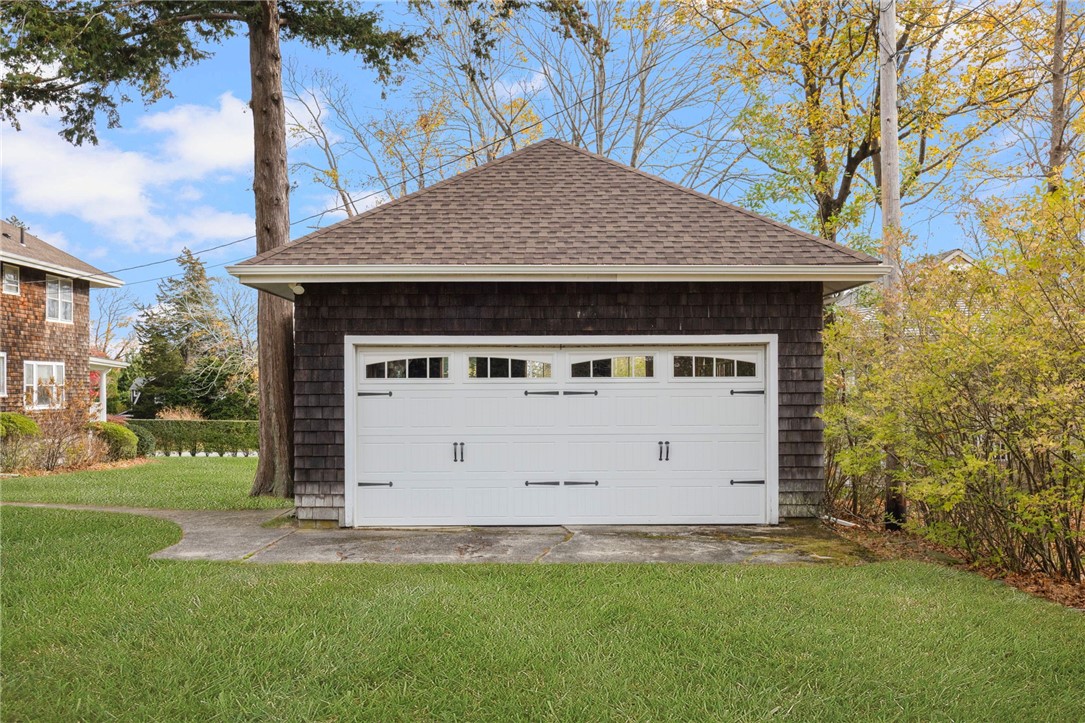 63 Longfellow Road Jamestown, RI 02835 - Photo 42 of 45 Detached garage has a newer roof, as does the house! The garage door was also recently replaced.
