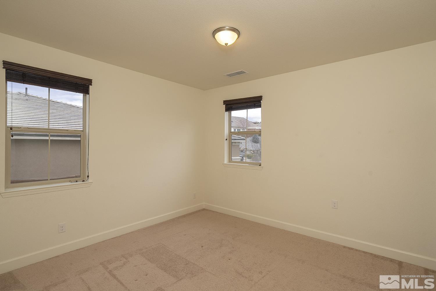 1675 Scott Valley Road Reno, NV 89523 - Photo 29 of 40 an empty room with a window
