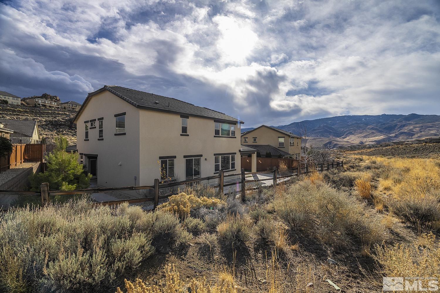 1675 Scott Valley Road Reno, NV 89523 - Photo 3 of 40 a view of a house with a yard and plants