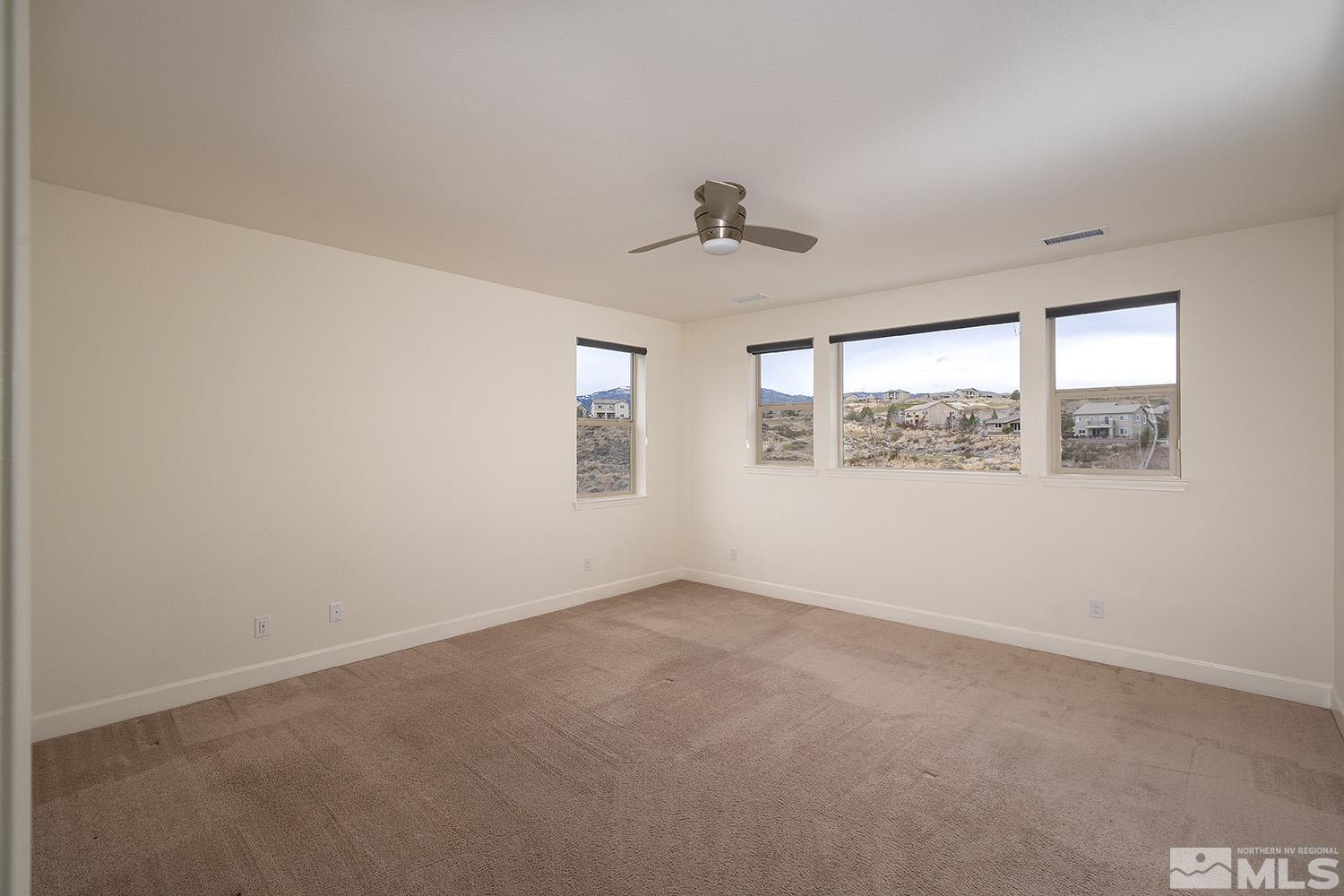 1675 Scott Valley Road Reno, NV 89523 - Photo 32 of 40 an empty room with windows