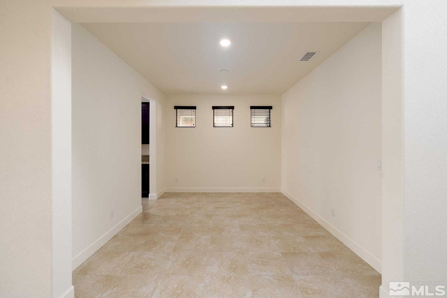 1675 Scott Valley Road Reno, NV 89523 - Photo 9 of 40 an empty room with windows