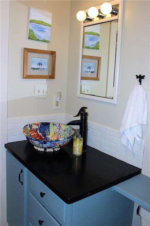 562 Springy Pond Road Ellsworth, ME 04605 - Photo 22 of 33 Full bath has sink made by local...