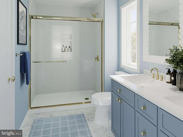 a bathroom with a granite countertop sink a toilet and shower