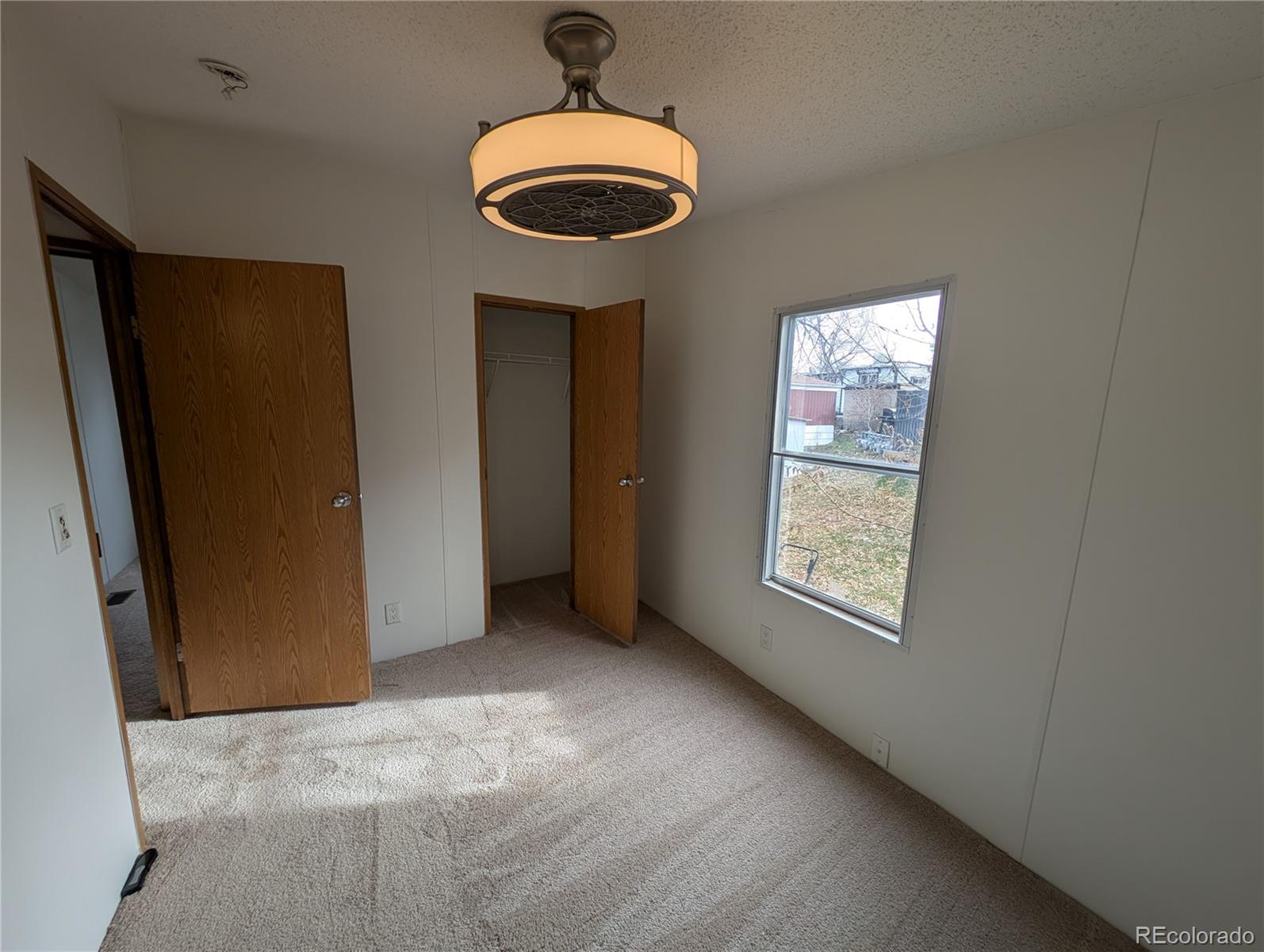 17190 Mt Vernon Road Golden, CO 80401 - Photo 18 of 29 a view of livingroom with washer and dryer