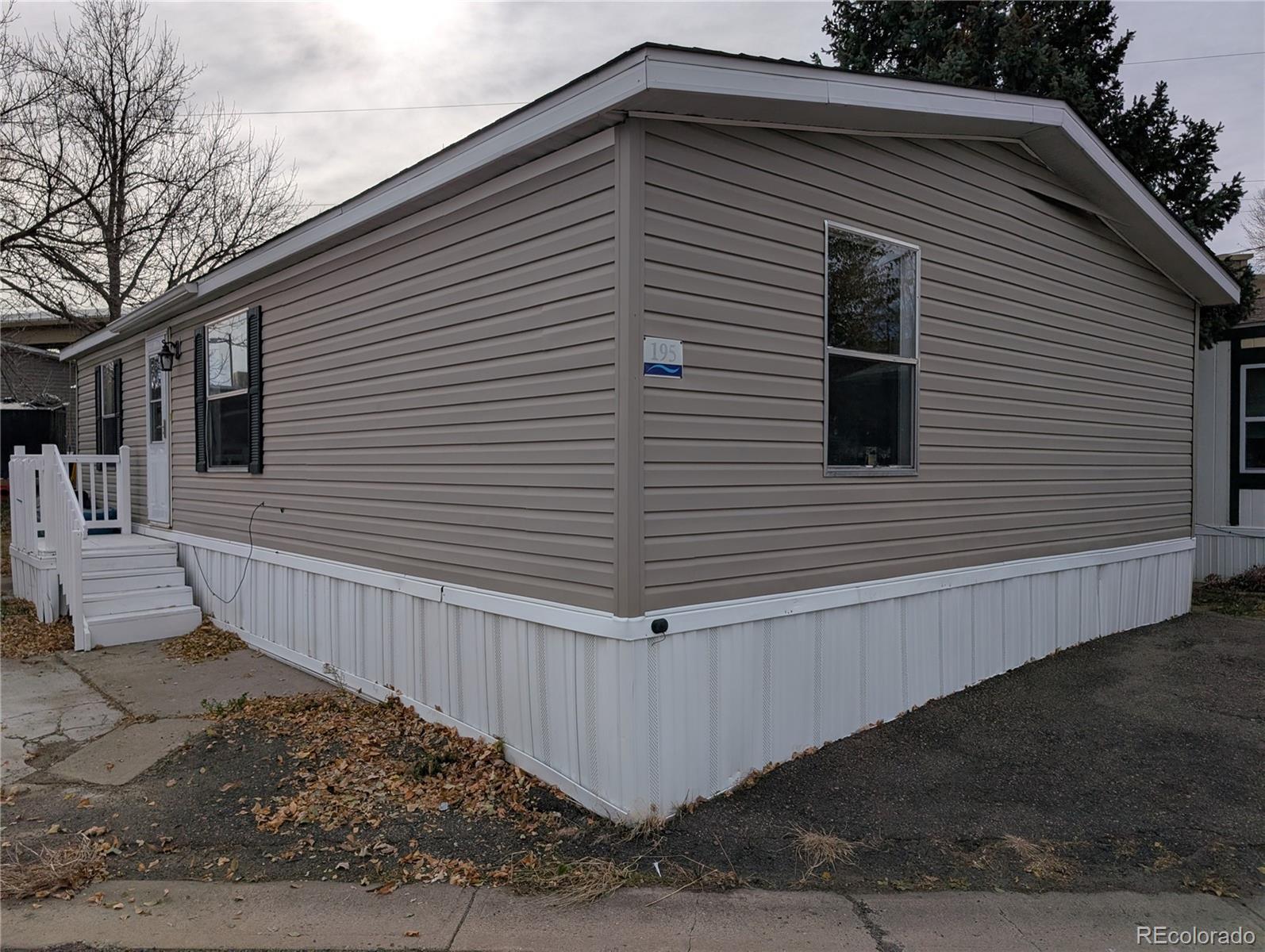 17190 Mt Vernon Road Golden, CO 80401 - Photo 26 of 29 a view of a house with a small deck