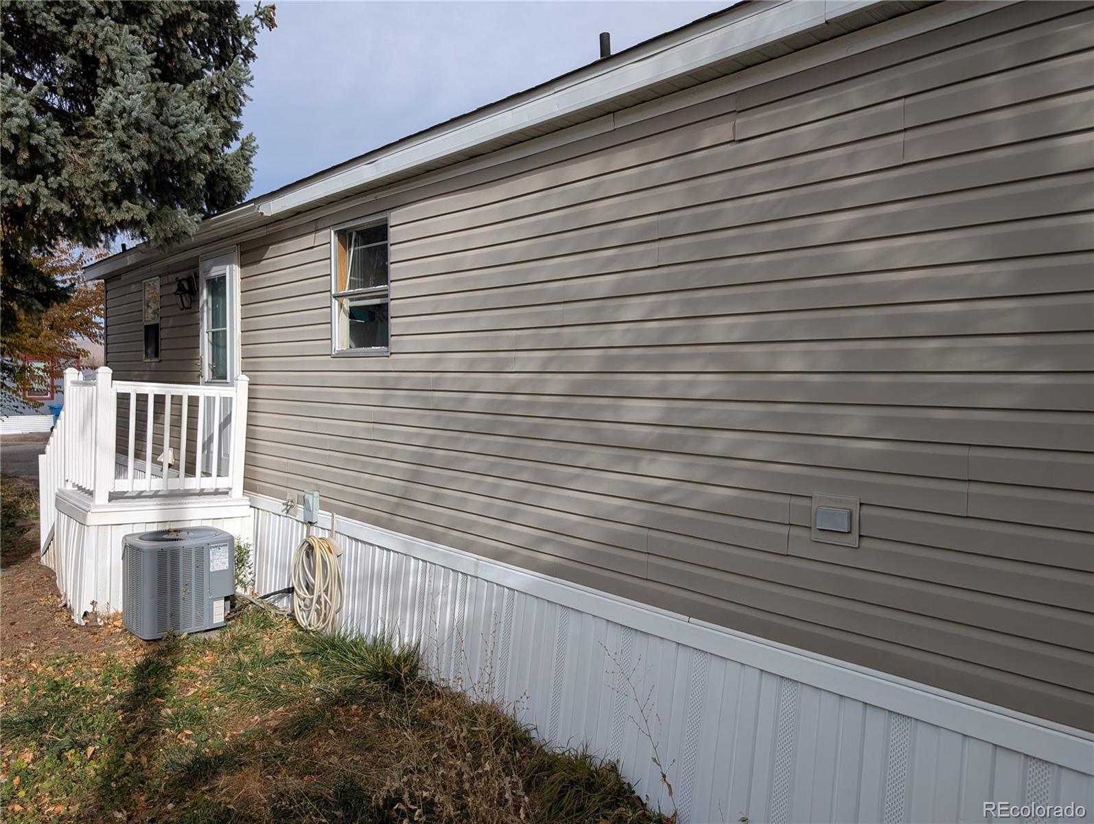 17190 Mt Vernon Road Golden, CO 80401 - Photo 5 of 29 a view of a house with a brick wall