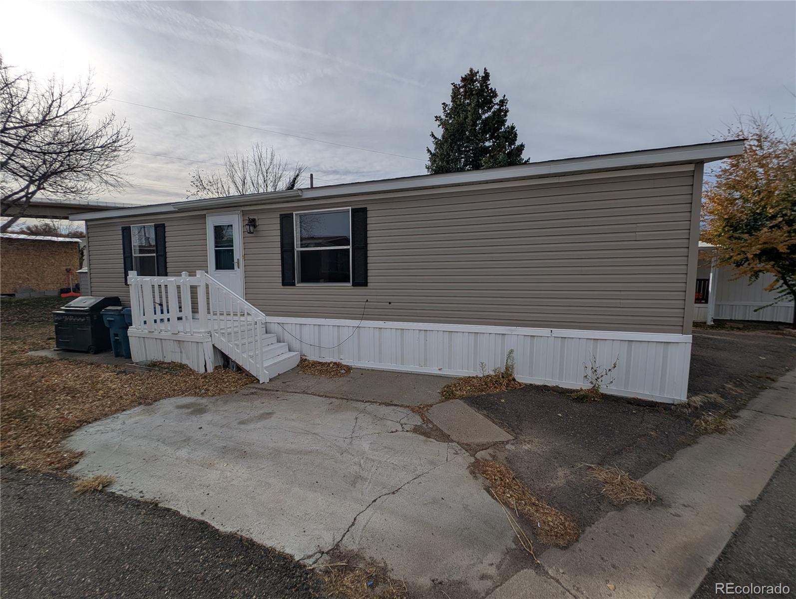 17190 Mt Vernon Road Golden, CO 80401 - Photo 8 of 29 a view of a house with a patio