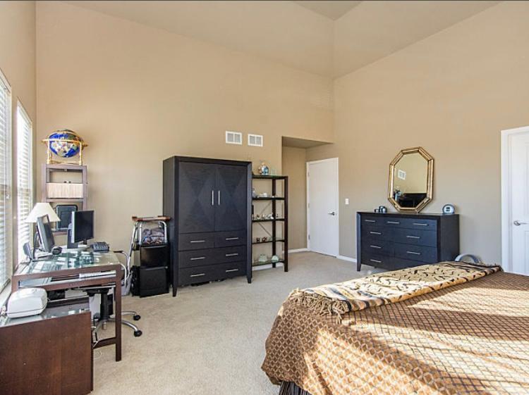 7426 West Fullerton Avenue Elmwood Park, IL 60707 - Photo 15 of 20 a bedroom with a bed and a dresser