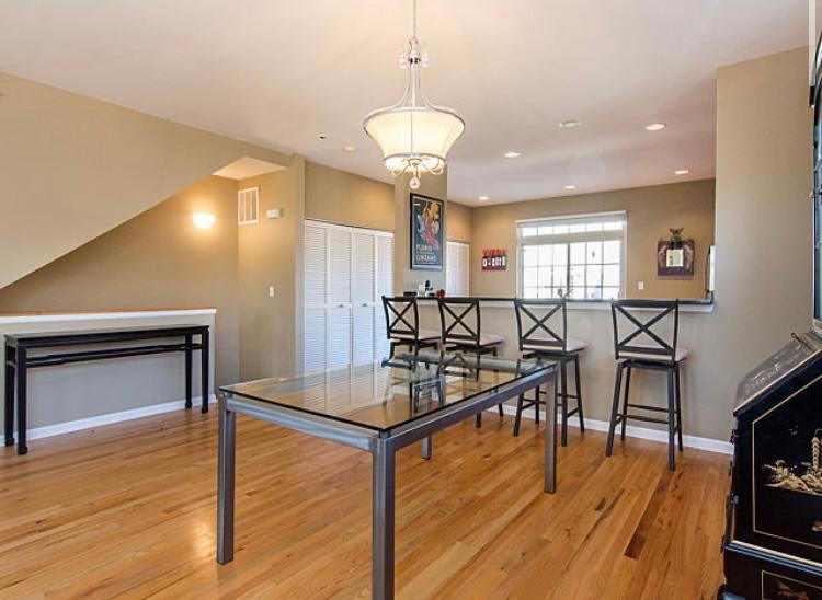 7426 West Fullerton Avenue Elmwood Park, IL 60707 - Photo 6 of 20 a view of a room with furniture and wooden floor