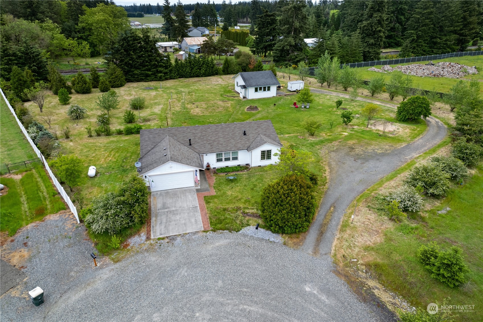 10532 School Land Road Southwest Rochester, WA 98579 - Photo 2 of 23 an aerial view of a house with outdoor space