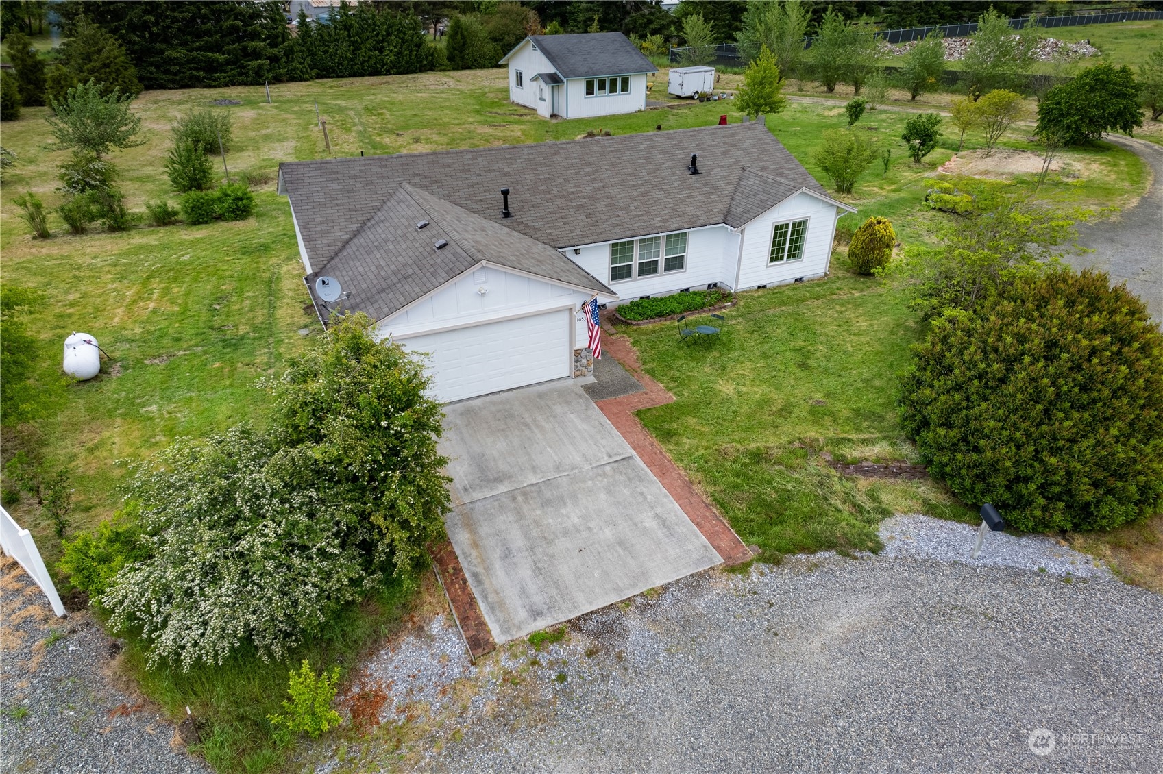 10532 School Land Road Southwest Rochester, WA 98579 - Photo 3 of 23 an aerial view of a house with a yard