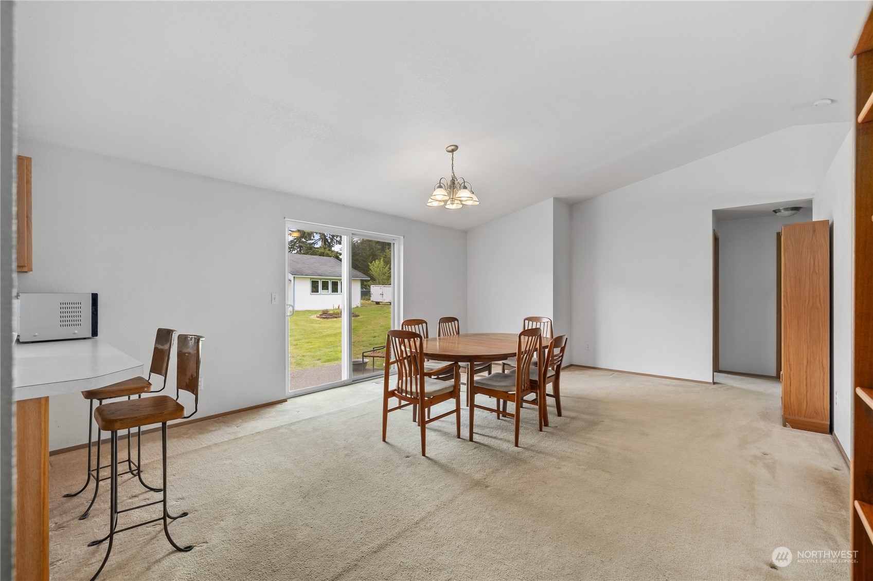 10532 School Land Road Southwest Rochester, WA 98579 - Photo 10 of 23 a dining room with furniture and window