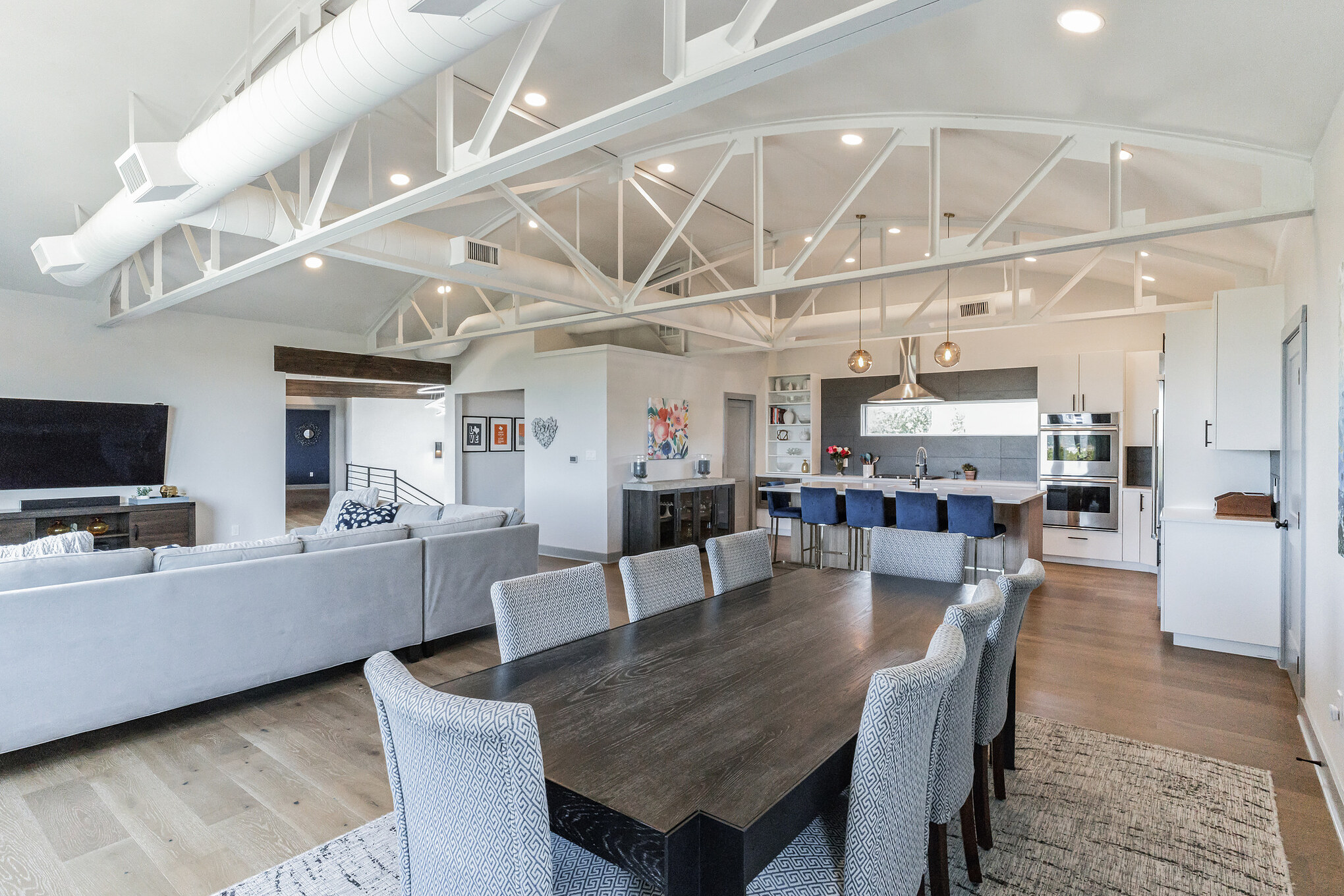 4227 Eck Lane Austin, TX 78734 - Photo 7 of 30 Dining space featuring light wood-type flooring and lofted ceiling