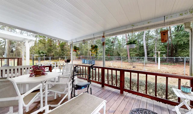 a view of porch with a seating space