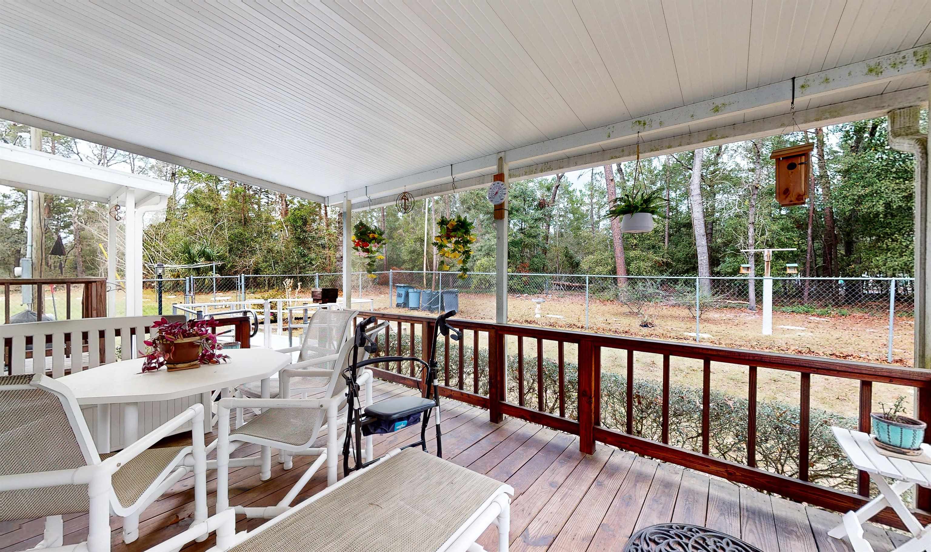 100 Harper Place Satsuma, FL 32189 - Photo 25 of 32 a view of porch with a seating space