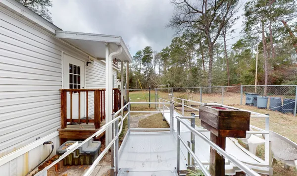 a view of a balcony with chairs