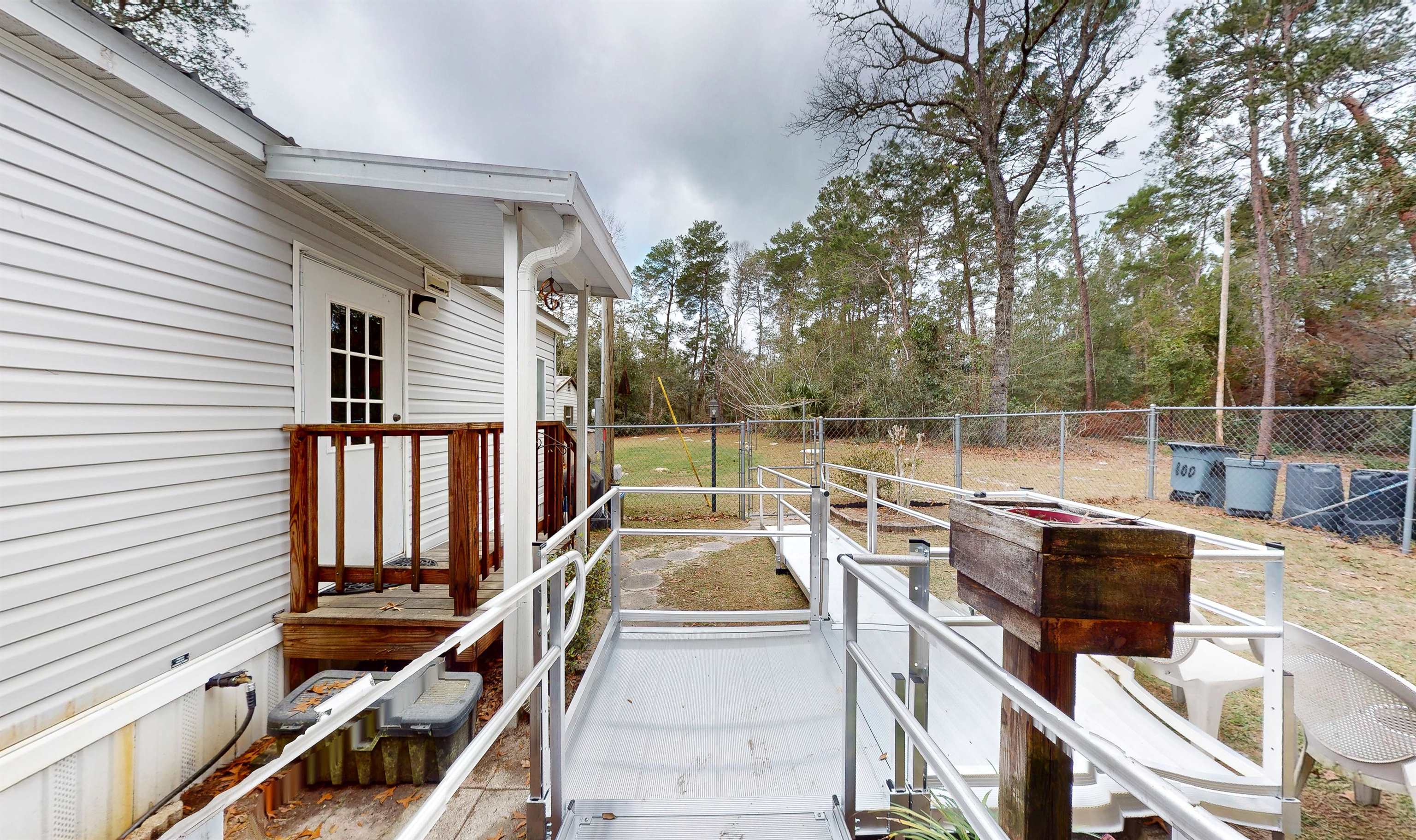 100 Harper Place Satsuma, FL 32189 - Photo 27 of 32 a view of a balcony with chairs