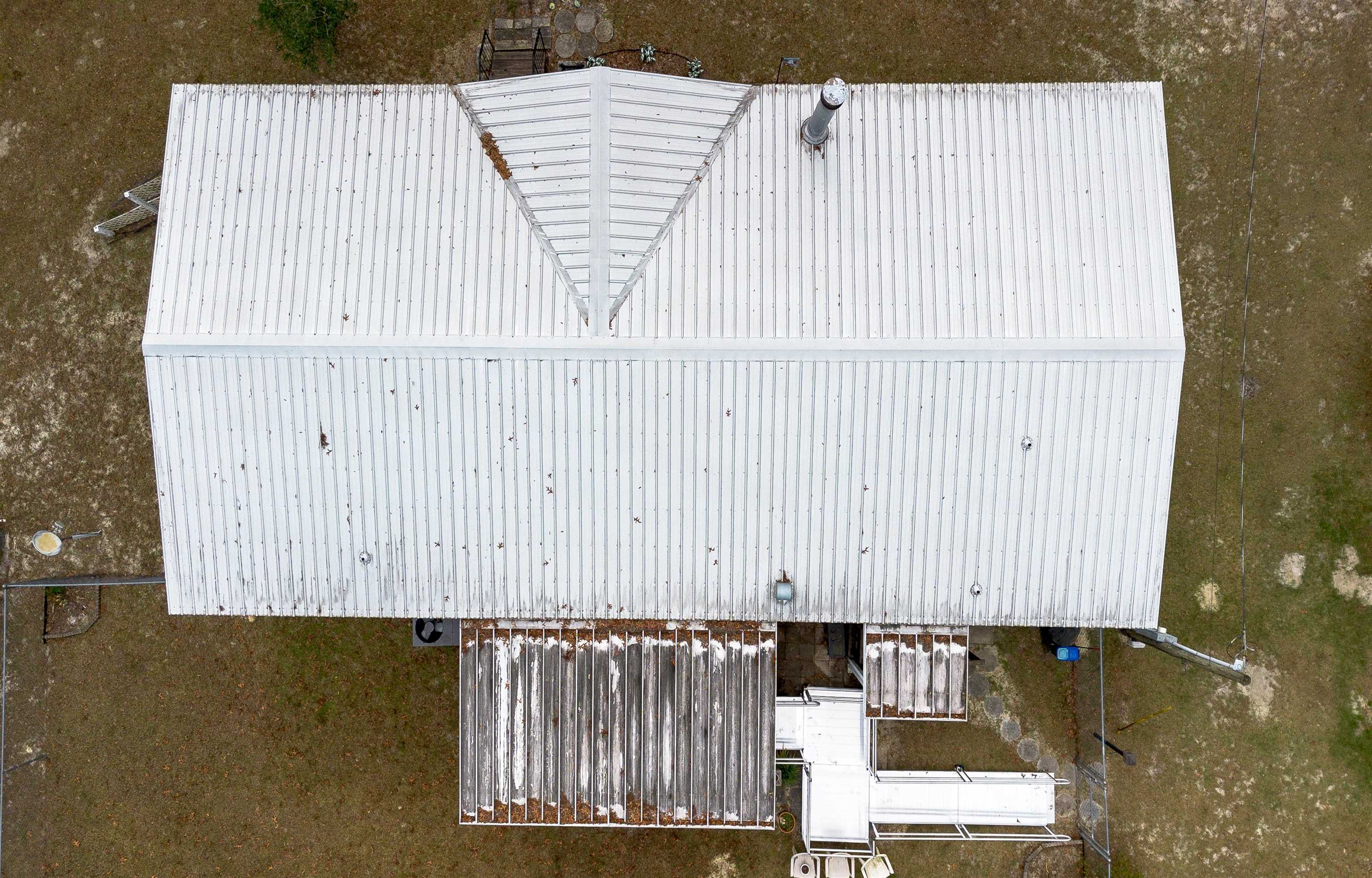 100 Harper Place Satsuma, FL 32189 - Photo 30 of 32 a view of a building with wooden floor