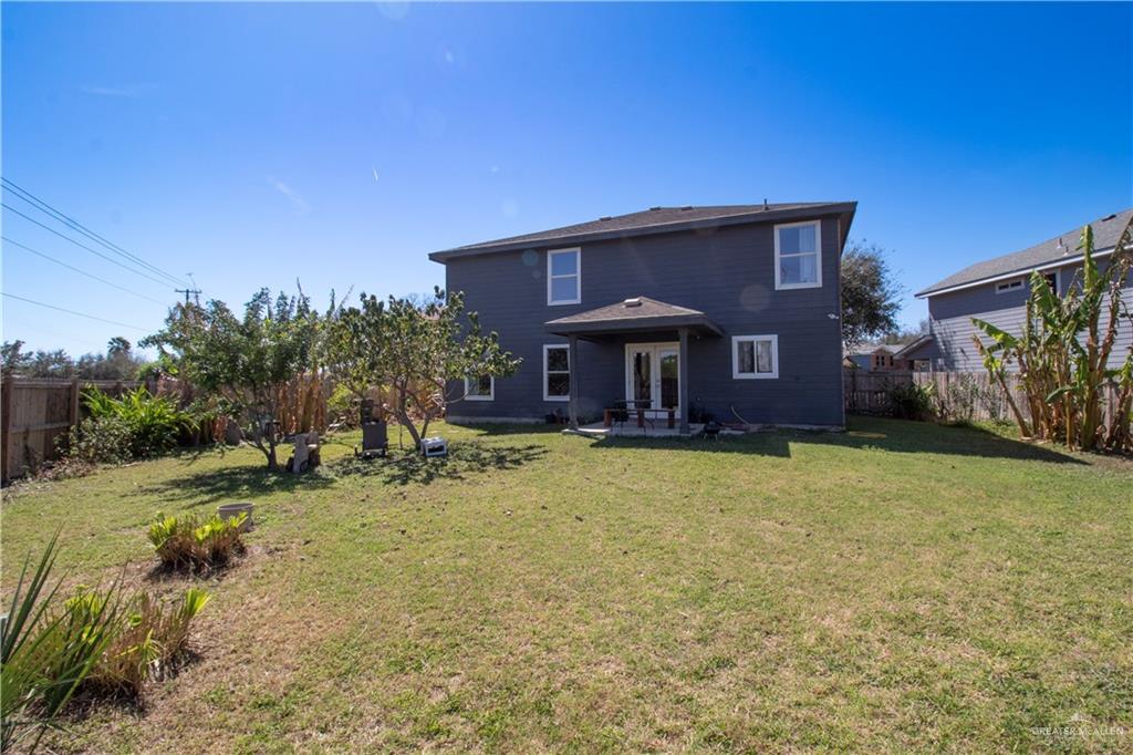 1307 Rio Grande Street San Juan, TX 78589 - Photo 21 of 23 a view of a house with a yard
