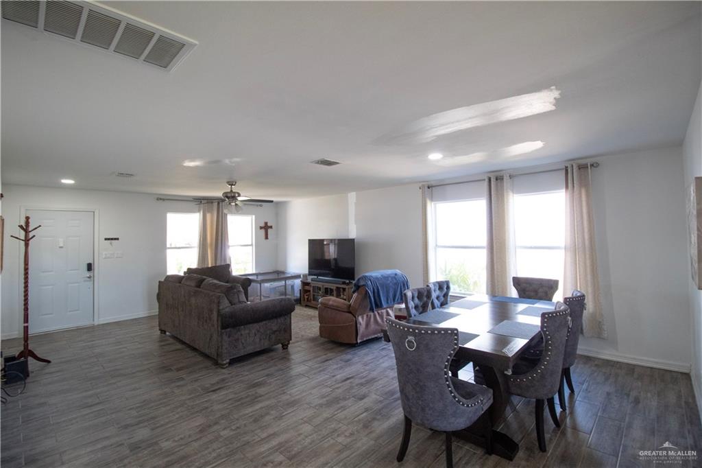 1307 Rio Grande Street San Juan, TX 78589 - Photo 3 of 23 a living room with furniture flat screen tv and window