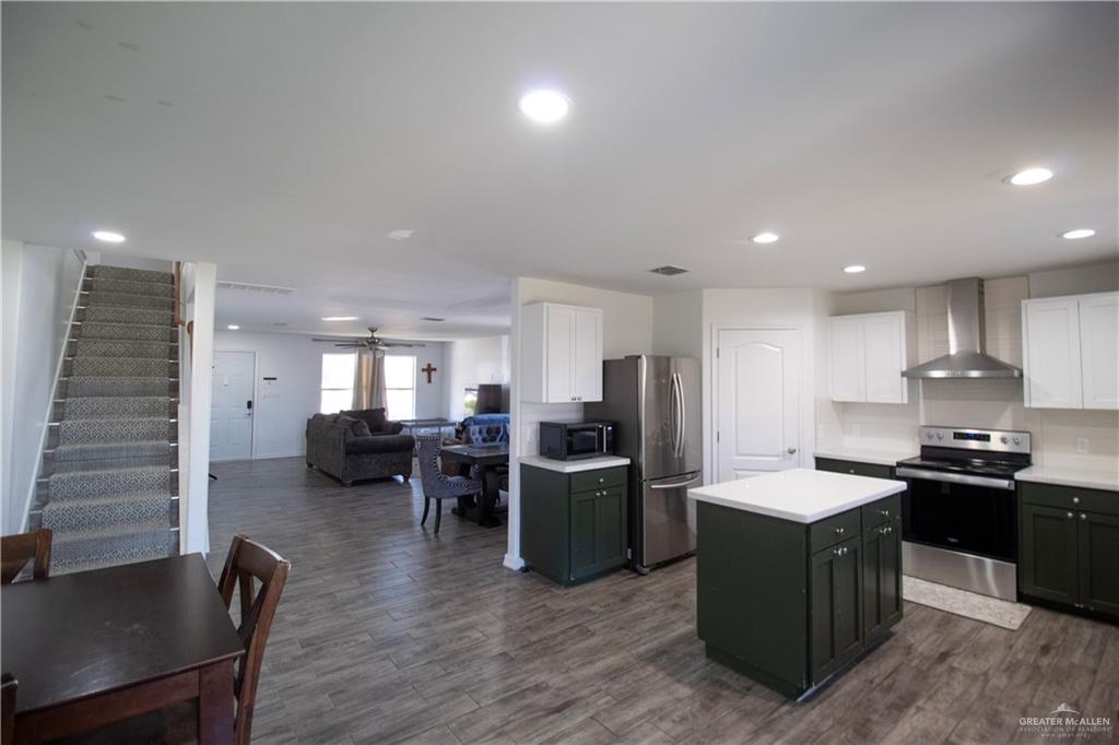 1307 Rio Grande Street San Juan, TX 78589 - Photo 5 of 23 a kitchen with a sink and cabinets