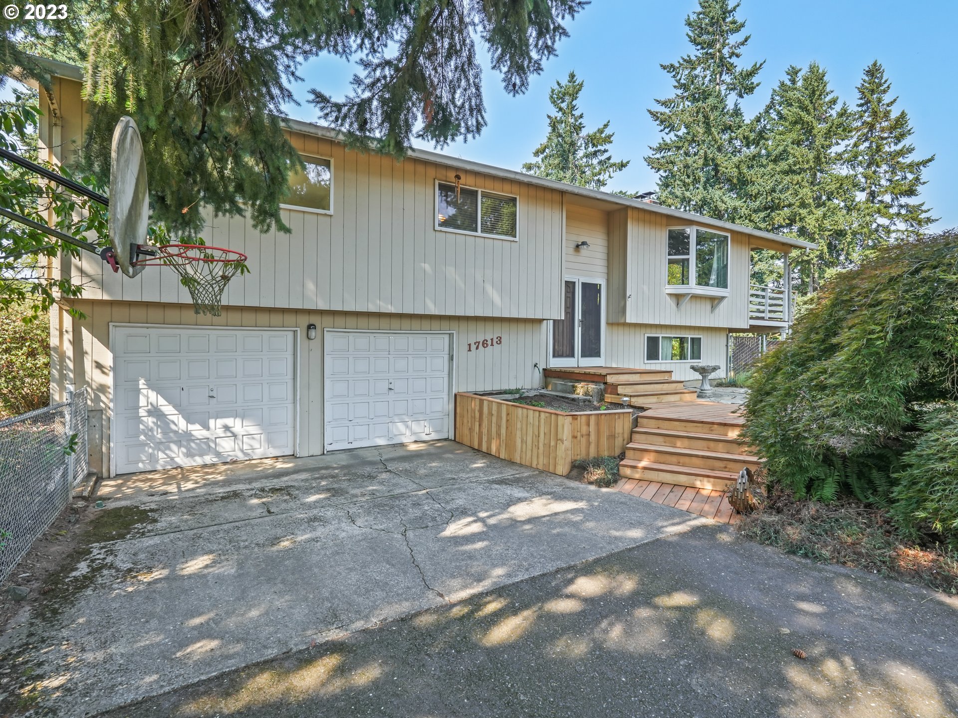 17613 Forsythe Road Oregon City, OR 97045 - Photo 2 of 4 a view of a house with backyard and sitting area