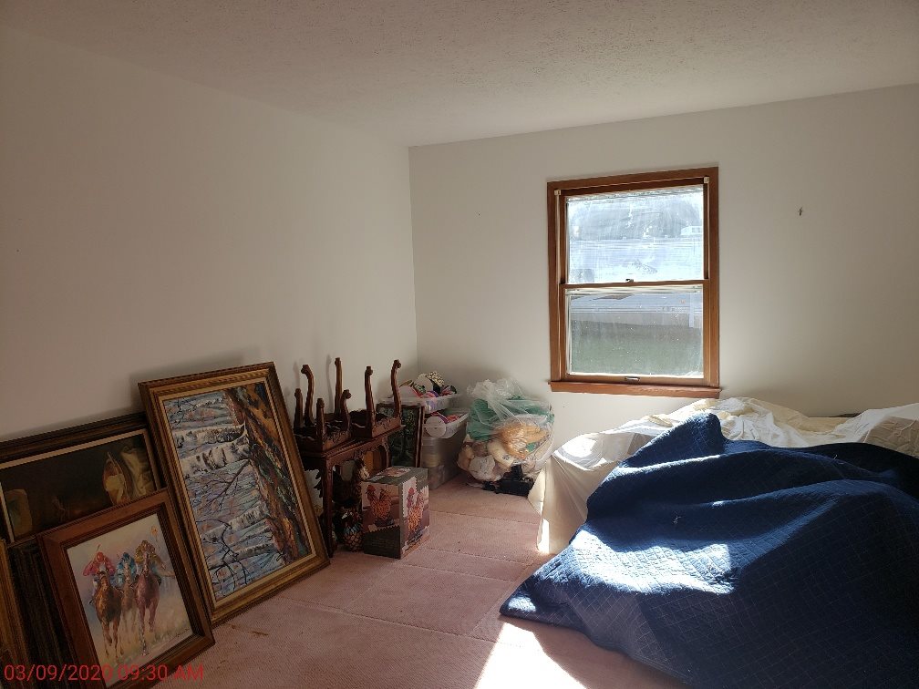 2432 Freeport Road Rockton, IL 61072 - Photo 19 of 22 a bed room with a bed and a window