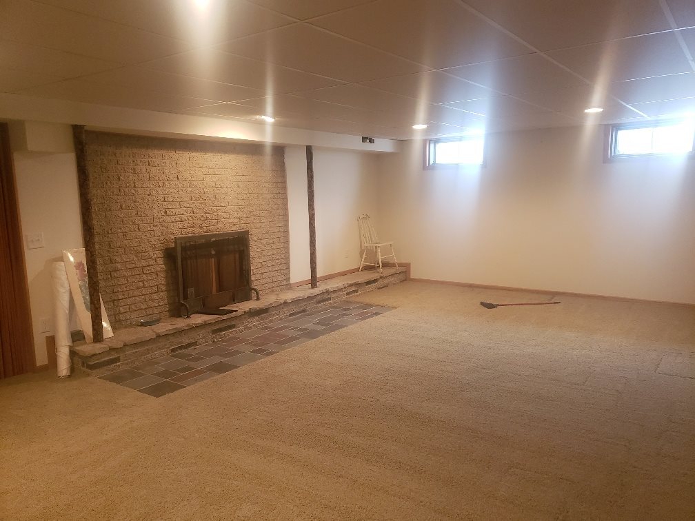 2432 Freeport Road Rockton, IL 61072 - Photo 21 of 22 an empty room with fireplace and windows