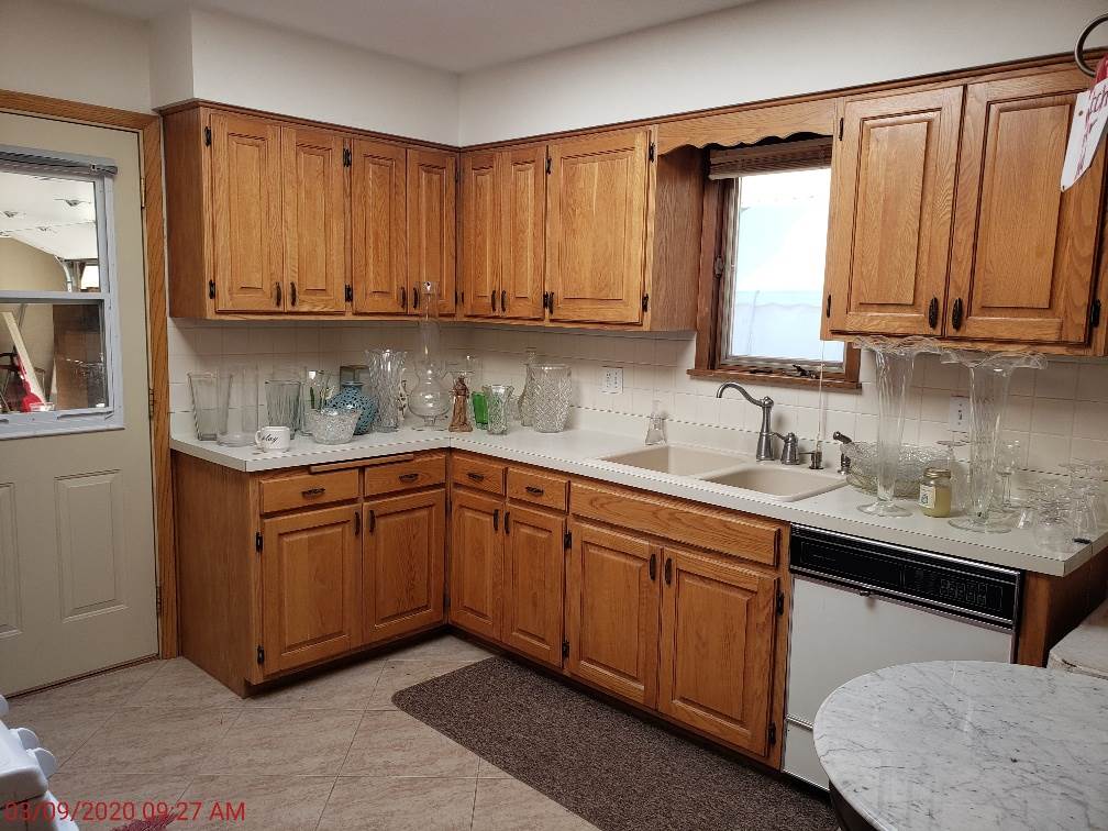 2432 Freeport Road Rockton, IL 61072 - Photo 9 of 22 a kitchen with stainless steel appliances granite countertop a sink window and cabinets
