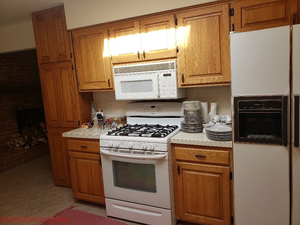 2432 Freeport Road Rockton, IL 61072 - Photo 10 of 22 a kitchen with a stove and a microwave